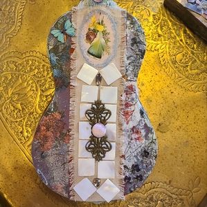 Hand decorated mosaic, bohemian, retro, small guitar.